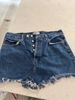 AGOLDE  Frayed Hem Denim Skirt in Dark Blue